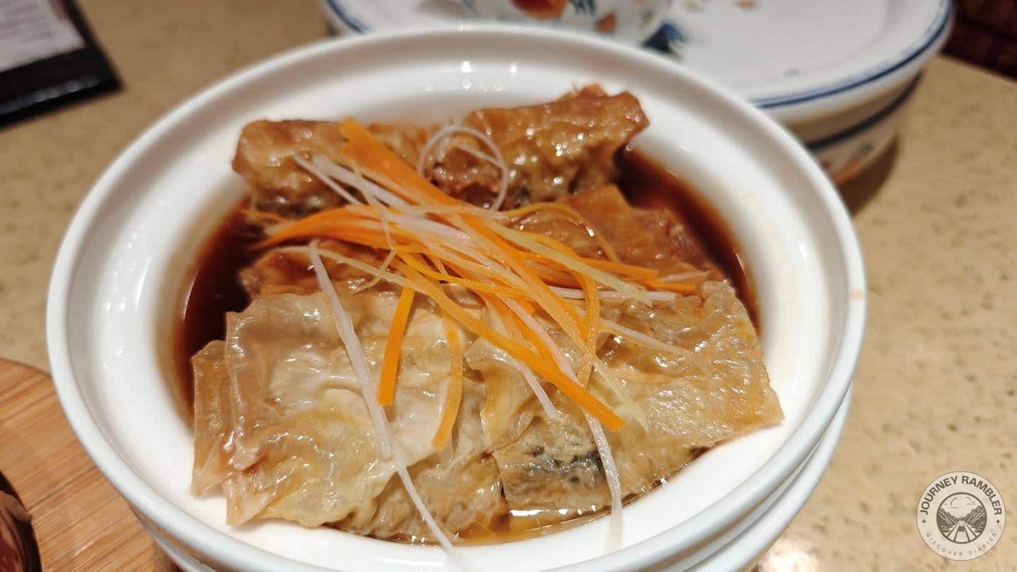 Enoki Mushroom Roll with Tofu Skin Braised in Abalone