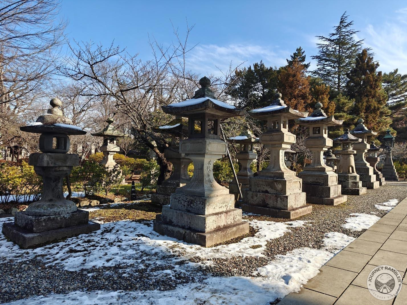 stone lanterns Zenkoji Temple