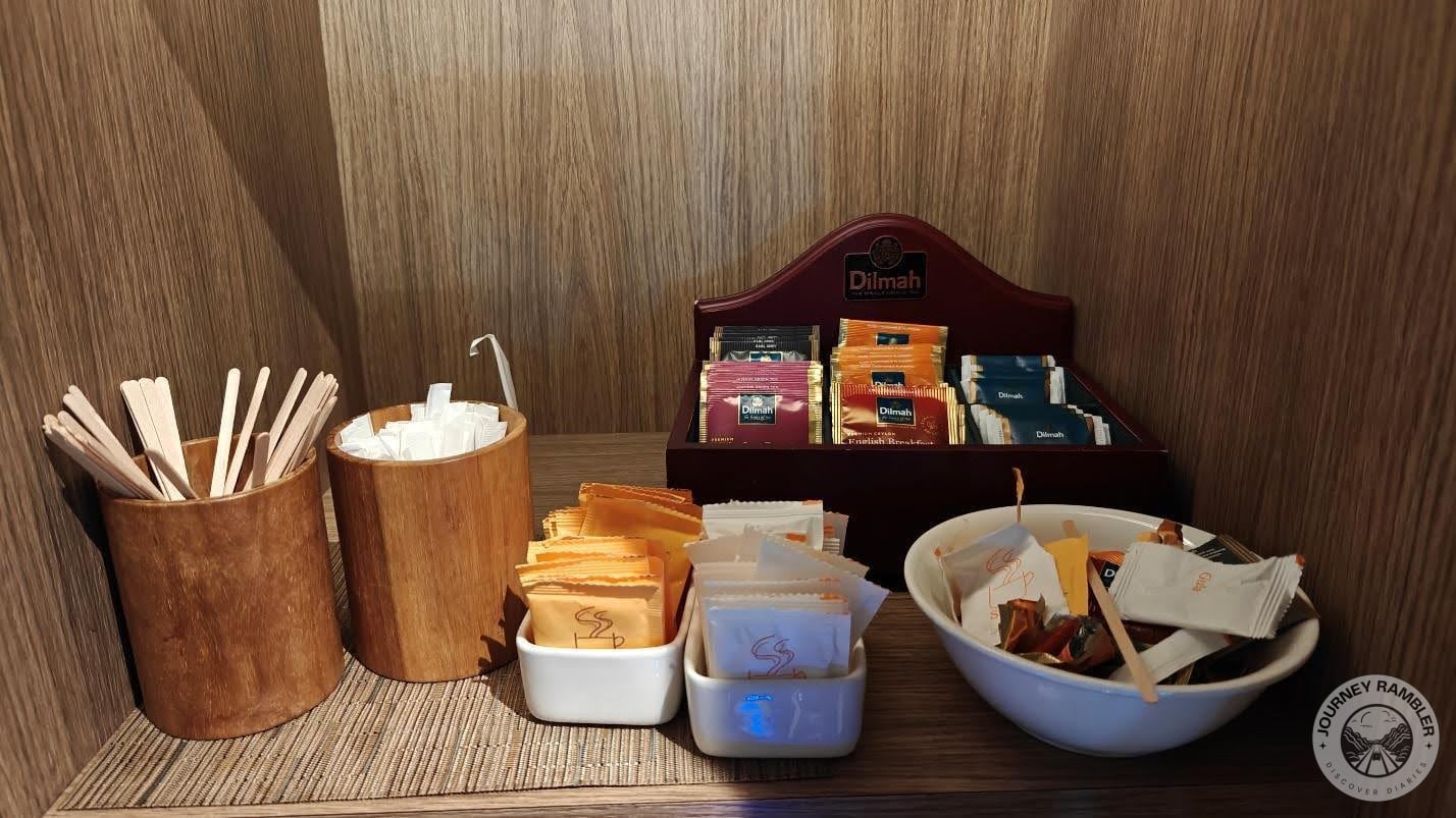 tea bags as well as stirrers, creamers, and sweeteners