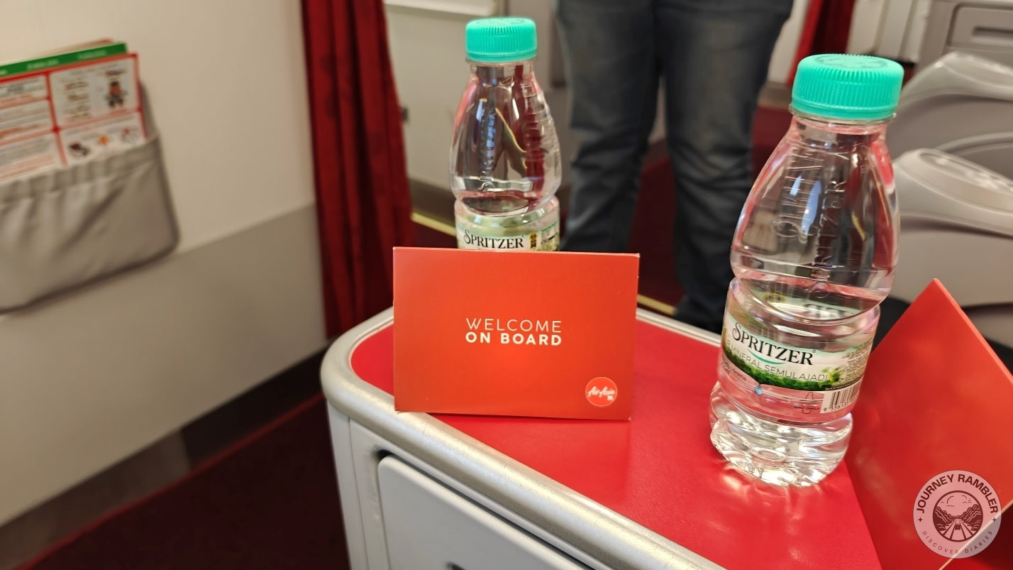 complimentary bottle of Spritzer and a welcome card