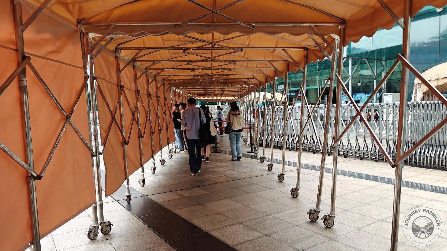covered walkway leading up to the entrance
