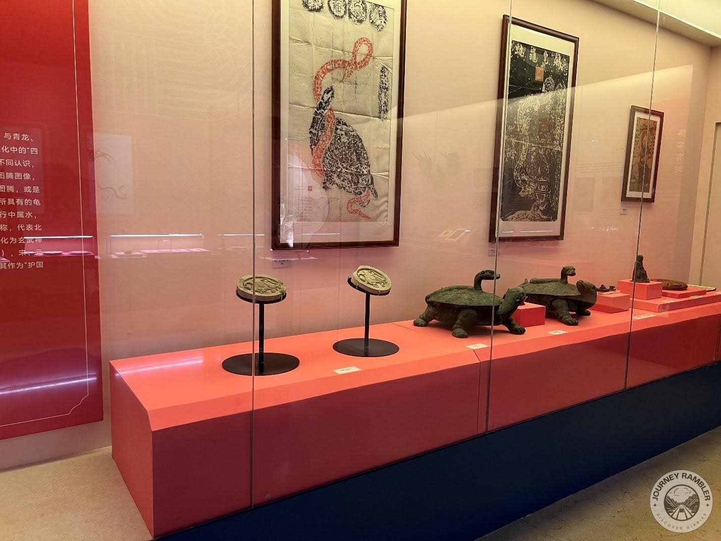 exhibit featuring paintings and other artifacts