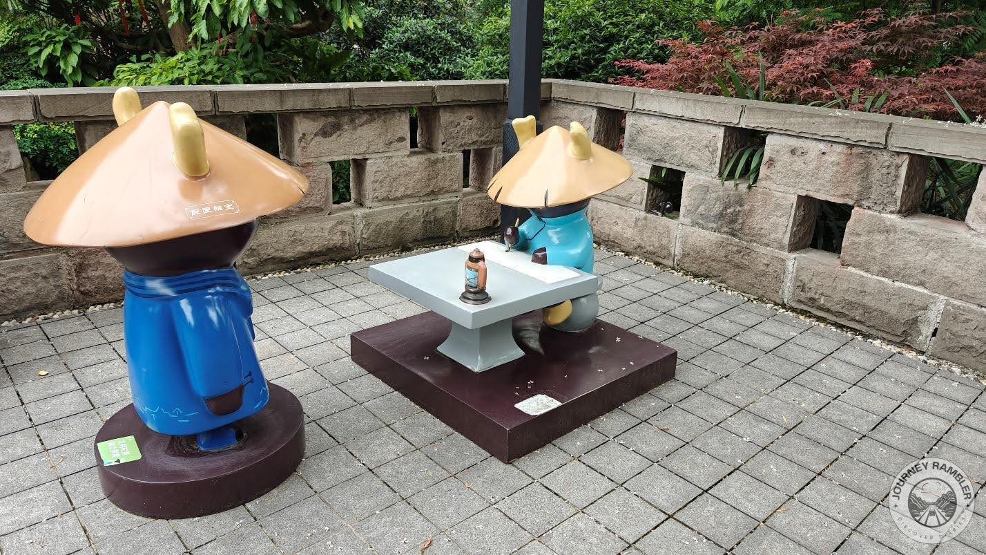 peculiar set of mini statue
