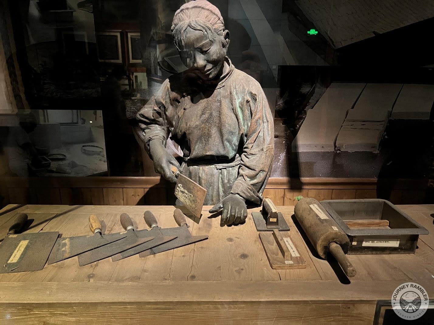 sculpture depicting a scene in a noodle shop