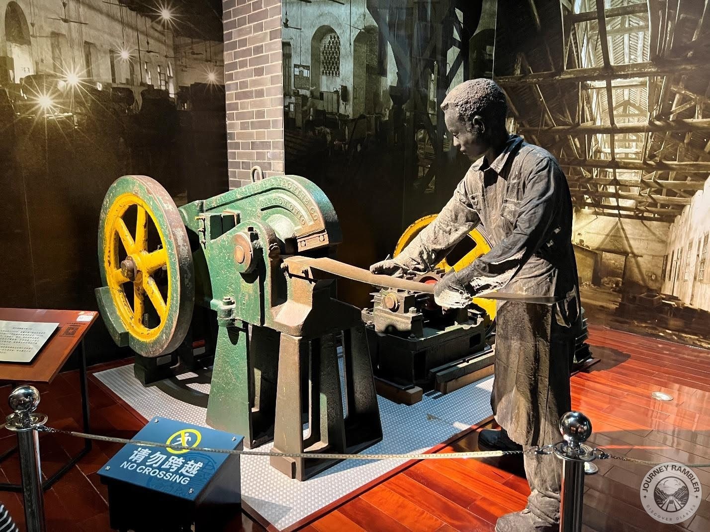 sculpture of a man working