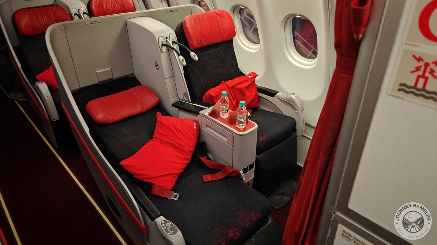 seat that's fully flat relative to its adjacent seat that's in the default position