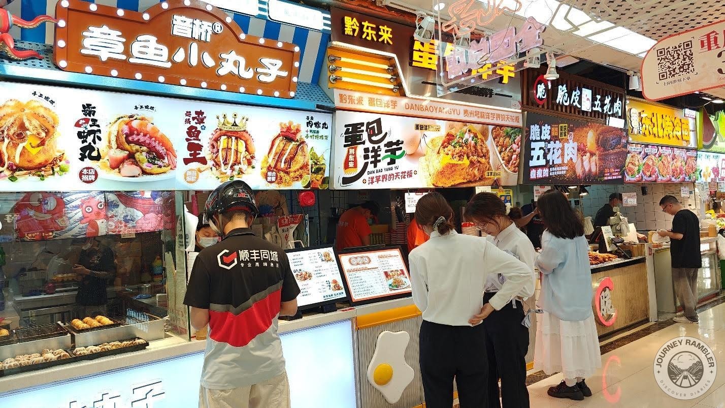 stall with some takoyaki balls being cooked