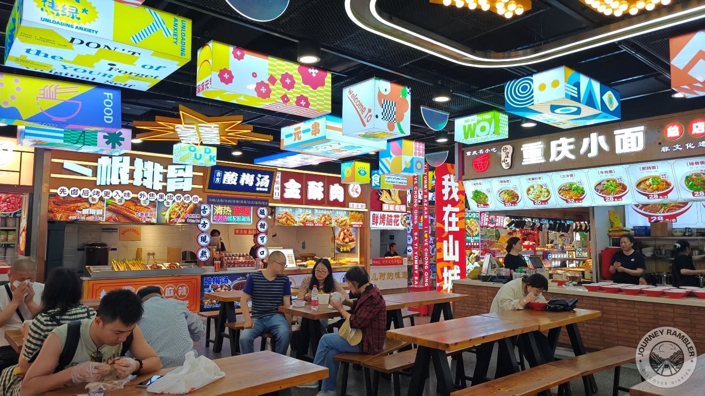stalls selling Chongqing Xiaomian, Jin Su Rou, and Suanmeitang