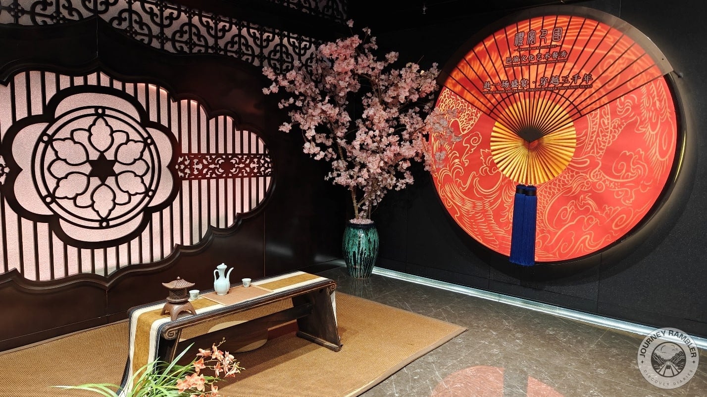 wooden Qin table with a teapot and two cups