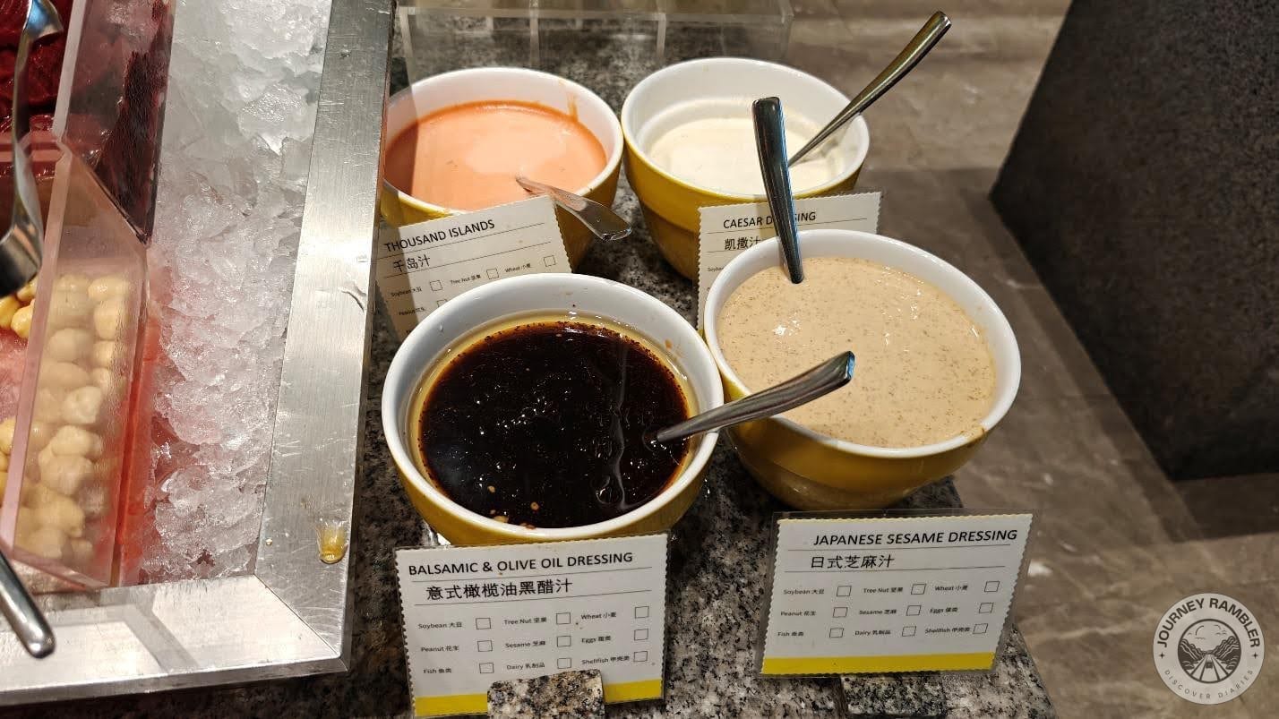 bowls containing salad dressings