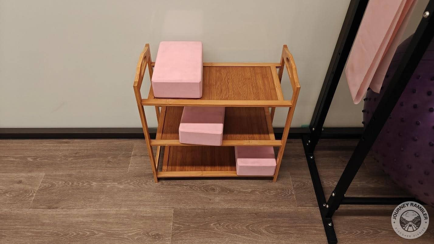 cute shelf that has yoga blocks