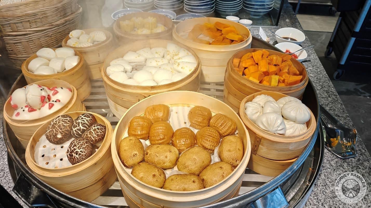 dim sum dishes placed in bamboo steamers