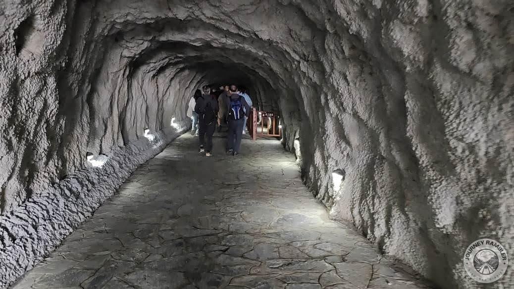 inside of the tunnel/cave was illuminated by lights