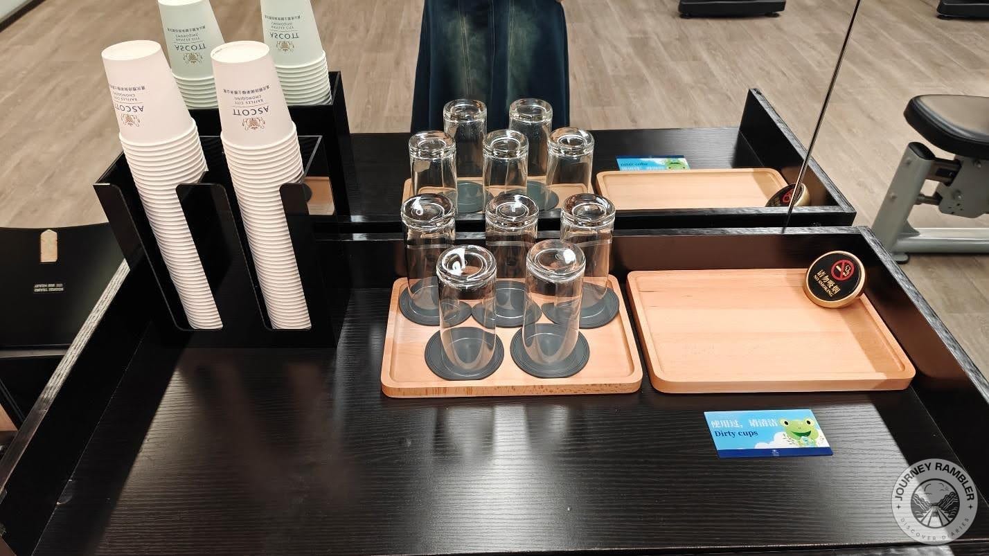 plastic cups as well as some glasses