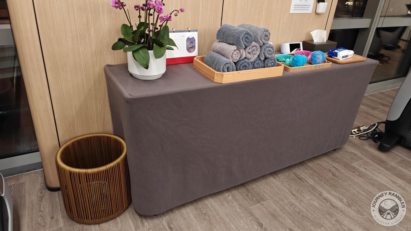 right of the bin is the table where you can get the complimentary towels
