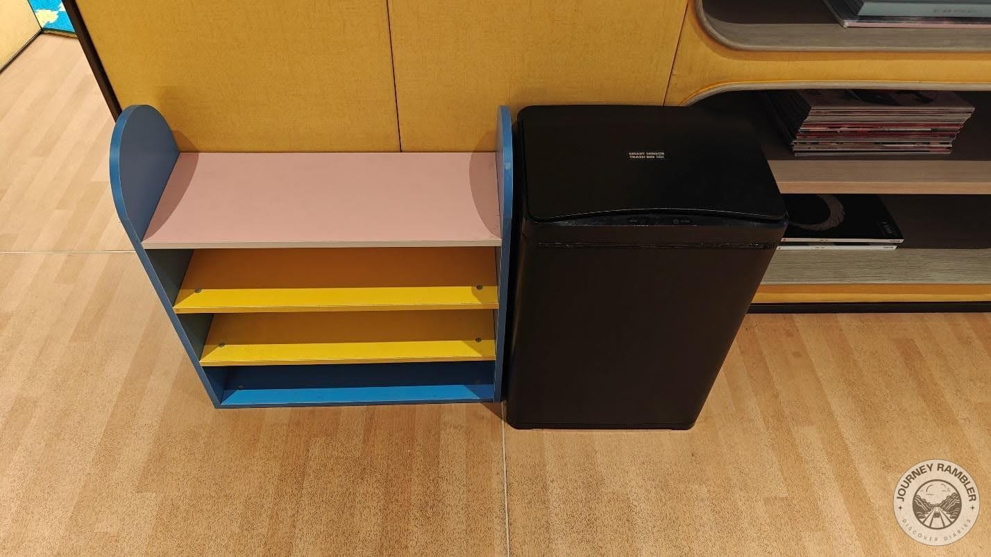 shoe rack for the kids and a smart trash bin