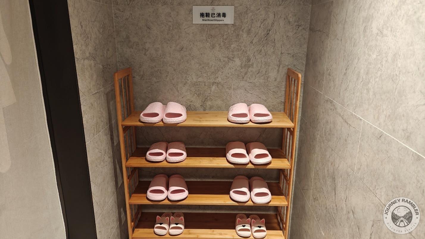 shoe rack replete with sterilized slippers