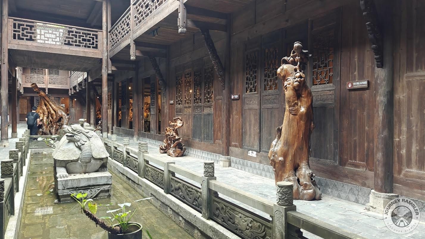 some other wooden sculptures close to the one of Jiao Ayi