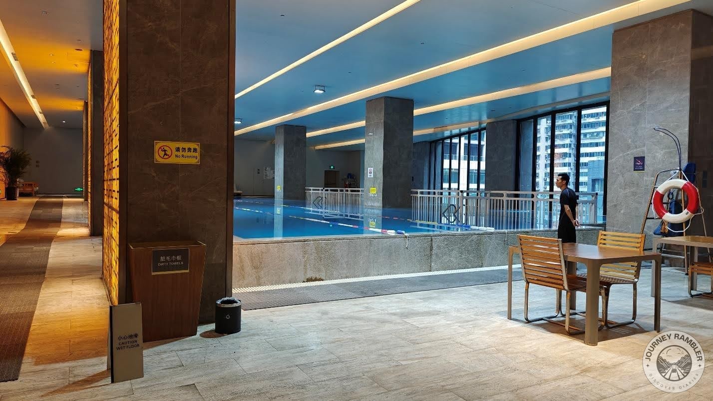 staff watching the pool area