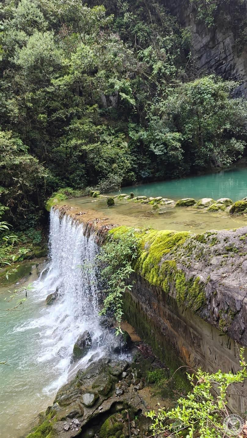 the cement where the water is falling is relatively new