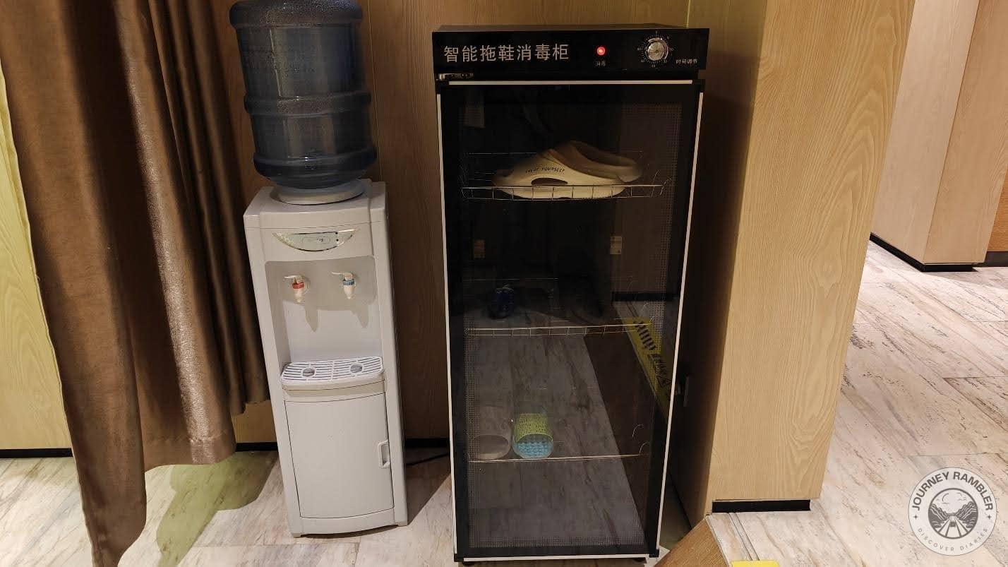 water dispenser and a slipper disinfection cabinet