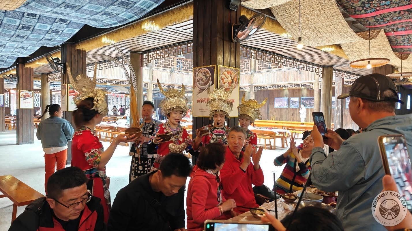 drink rice wine one by one, sing and clap