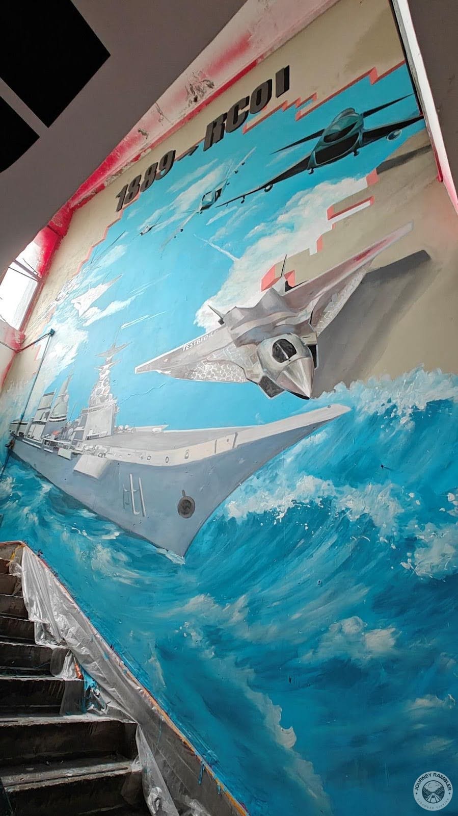 mural that showed off China’s aerial and naval might
