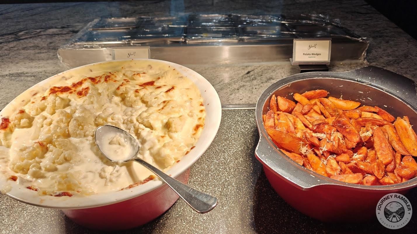 Cauliflower Gratin and a bowl full of Potato Wedges