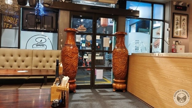 Near the door there were tall carved vases