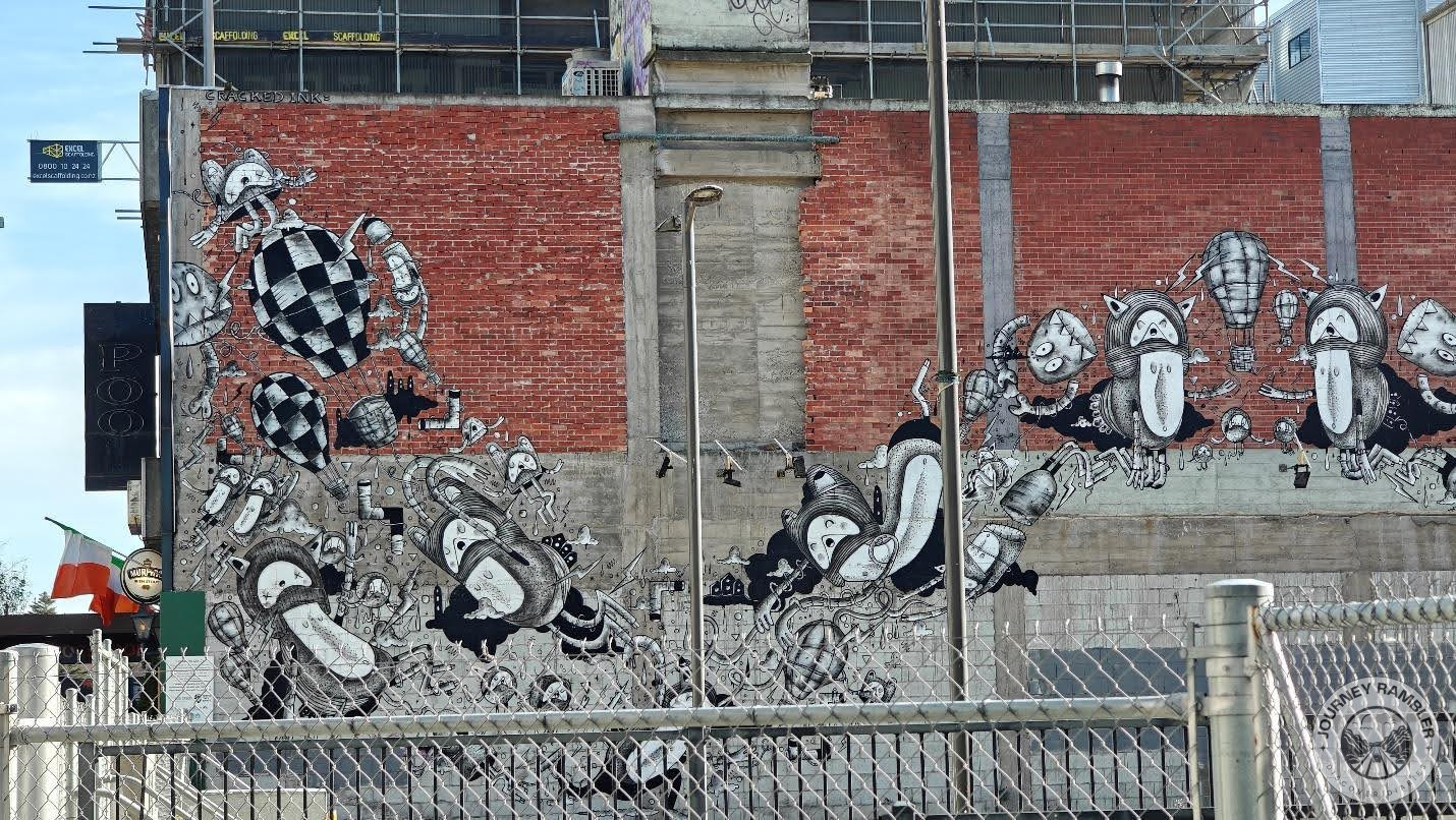 This mural is by the street artist Cracked Ink