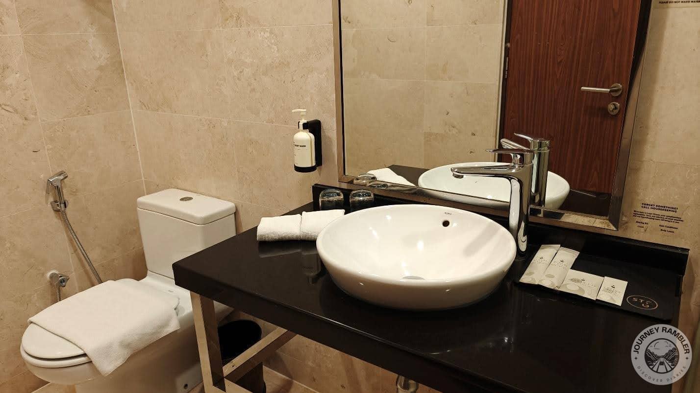 bathroom vanity and the toilet
