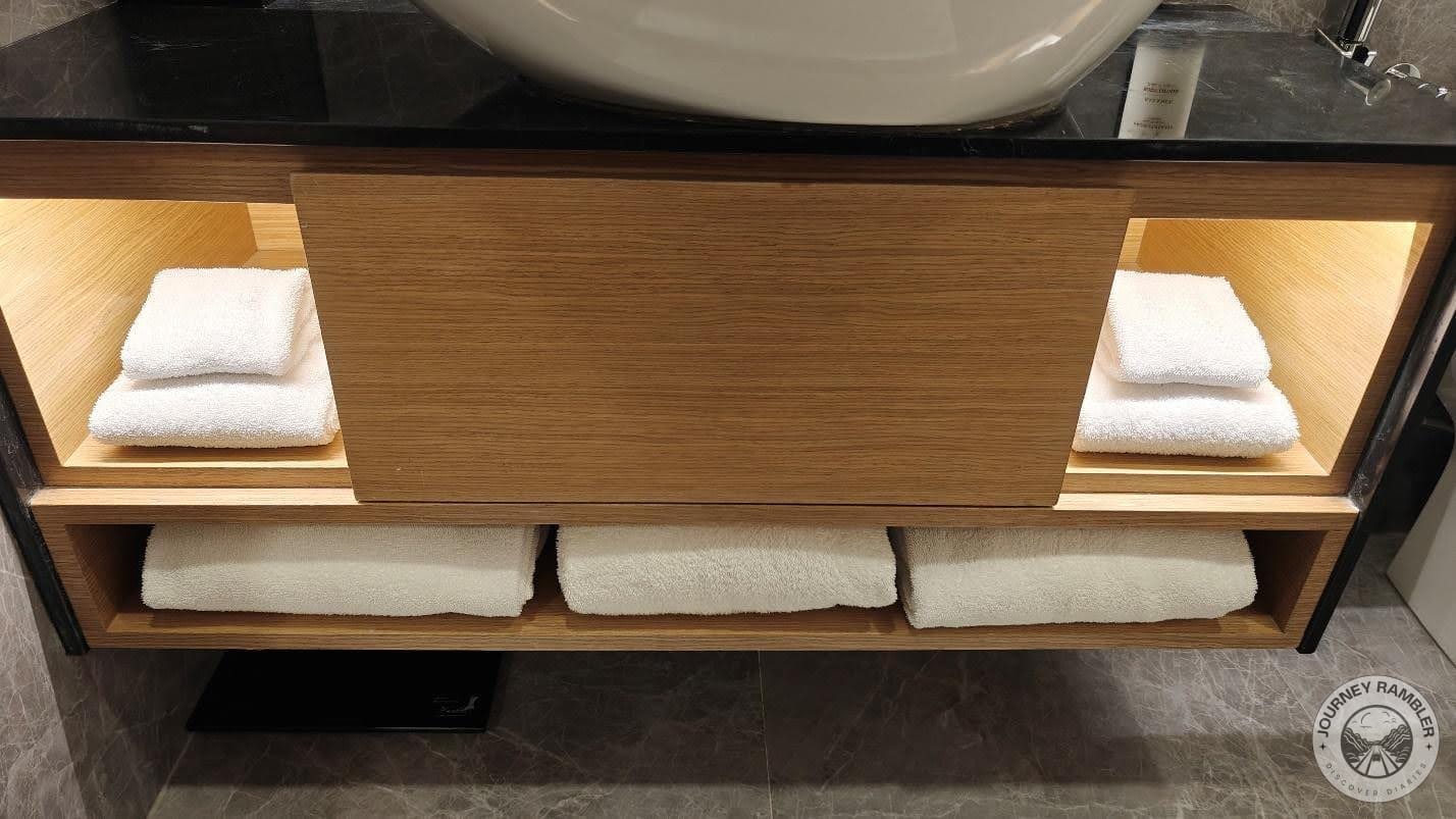 close up of the cabinet that the sink is sitting on