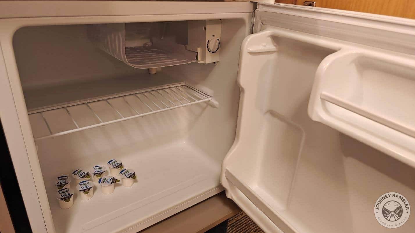 cupboard also had a small fridge