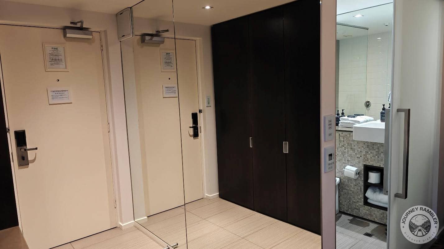 dressing area outside the bathroom had large mirrors