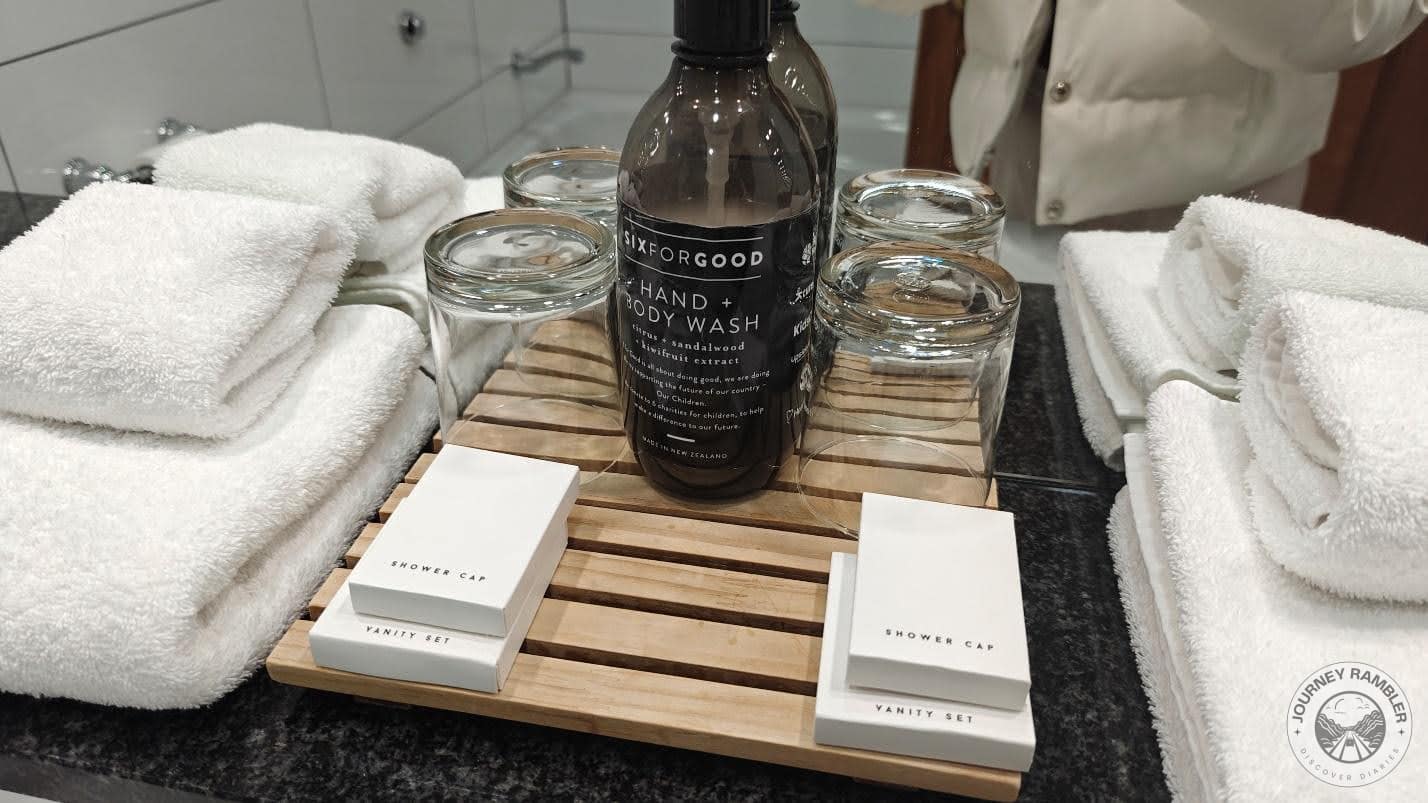 pair of shower caps and vanity sets in the bathroom