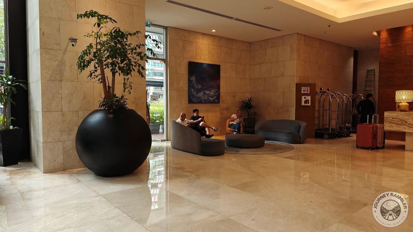picture of the lobby showing the side entrance and some of the sofas
