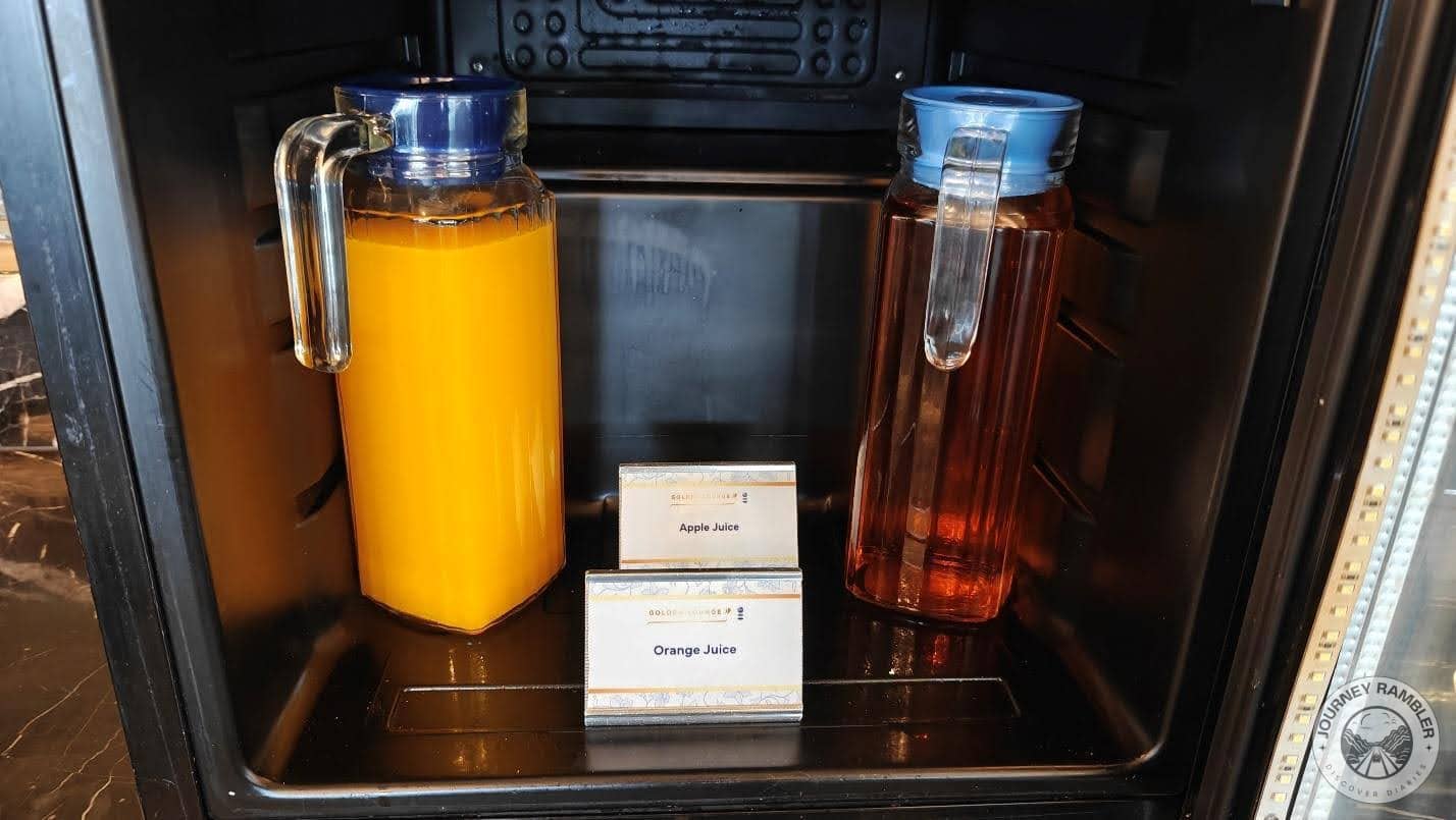 pitchers of both Orange and Apple Juice