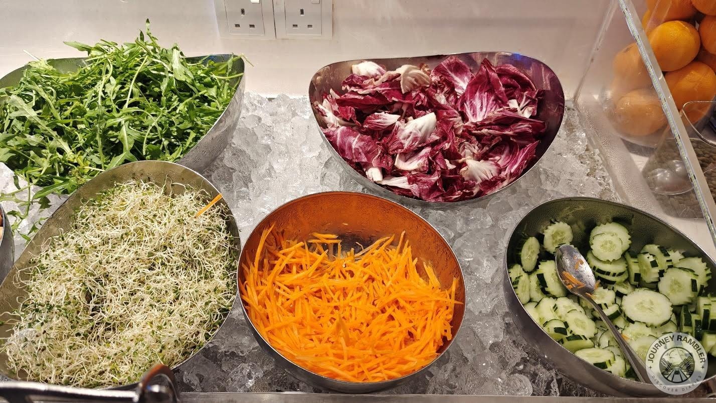 rocket arugula, cabbage, julienned carrots, cucumbers, and mung bean sprouts