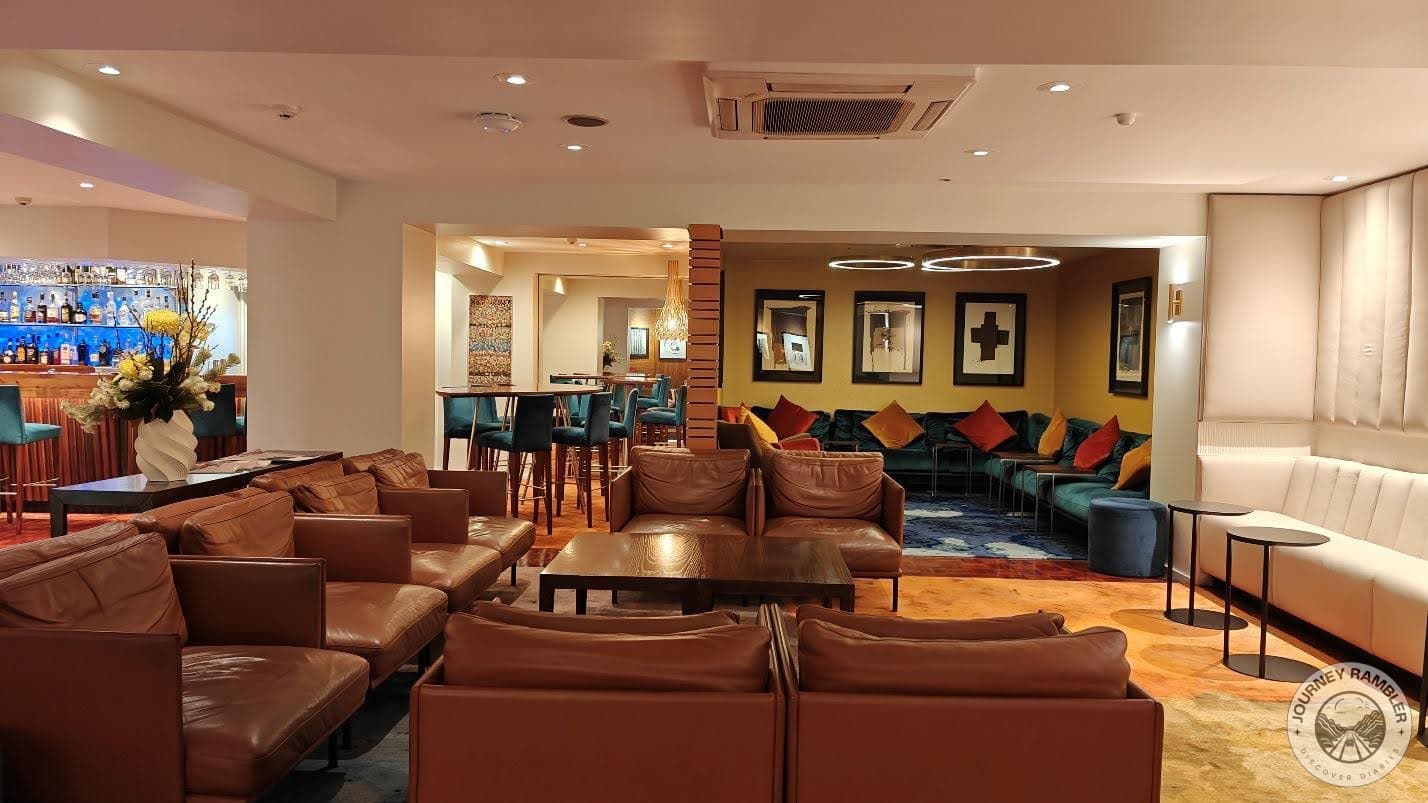 seating areas with bright cushions and paintings