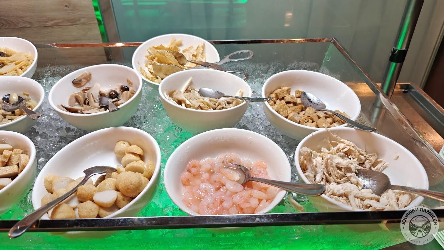 shrimp, oyster mushrooms, shredded chicken, and a variety of fish cakes
