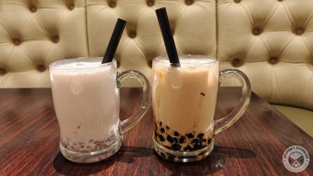 taro milk tea and brown sugar milk tea with black pearls