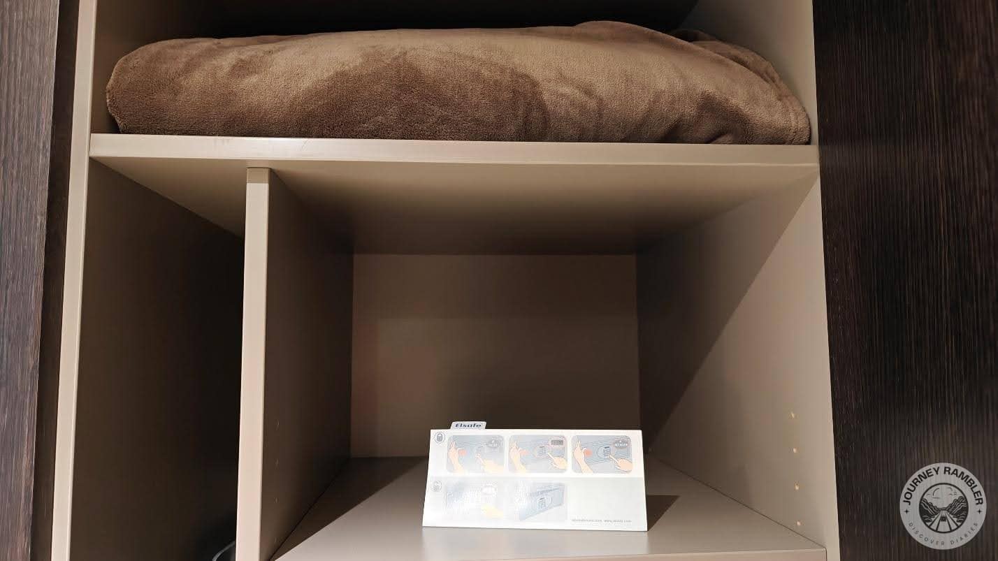 thick blanket tucked away on the top shelf