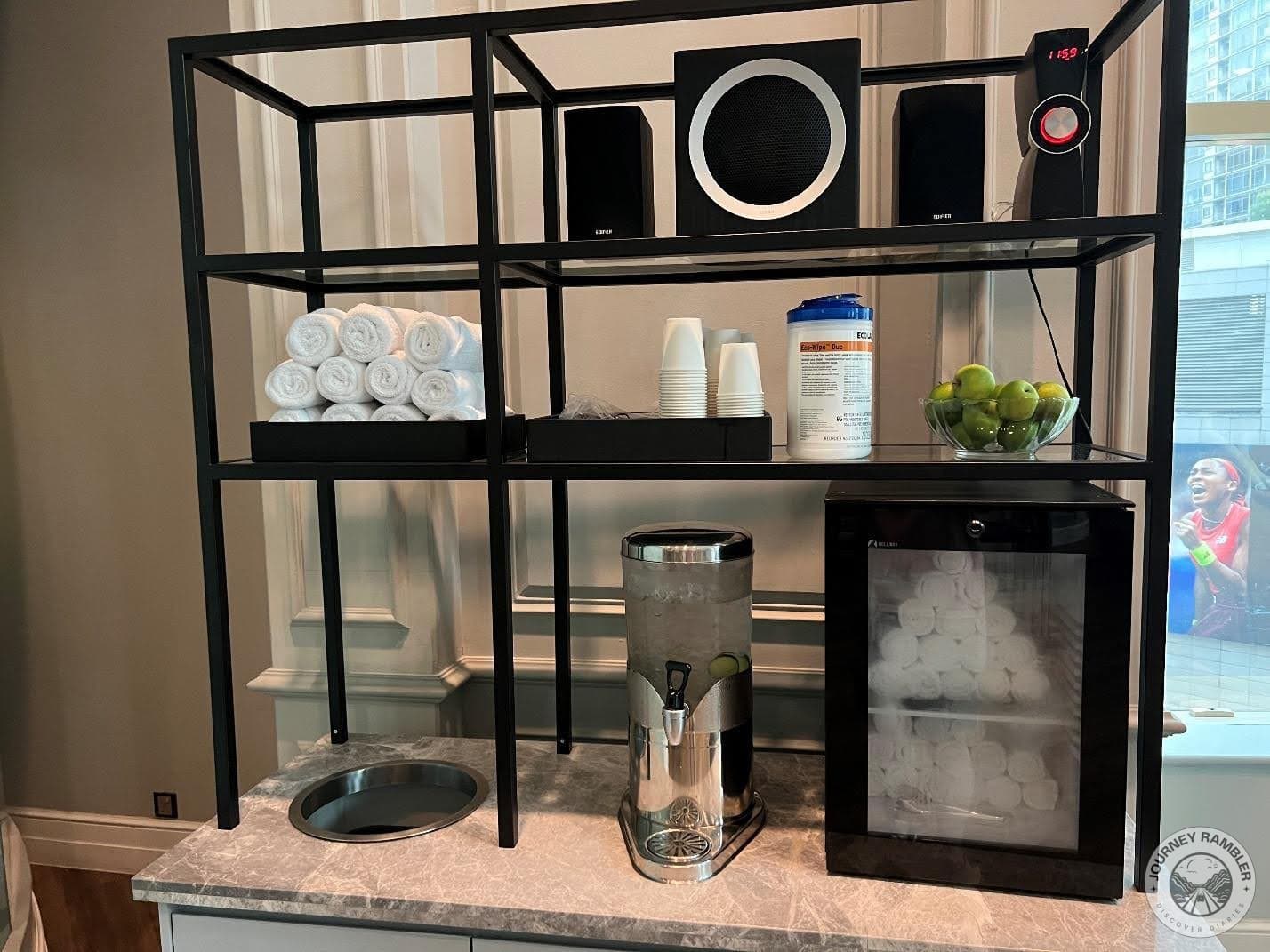 towels, water dispenser, and fruit bowl