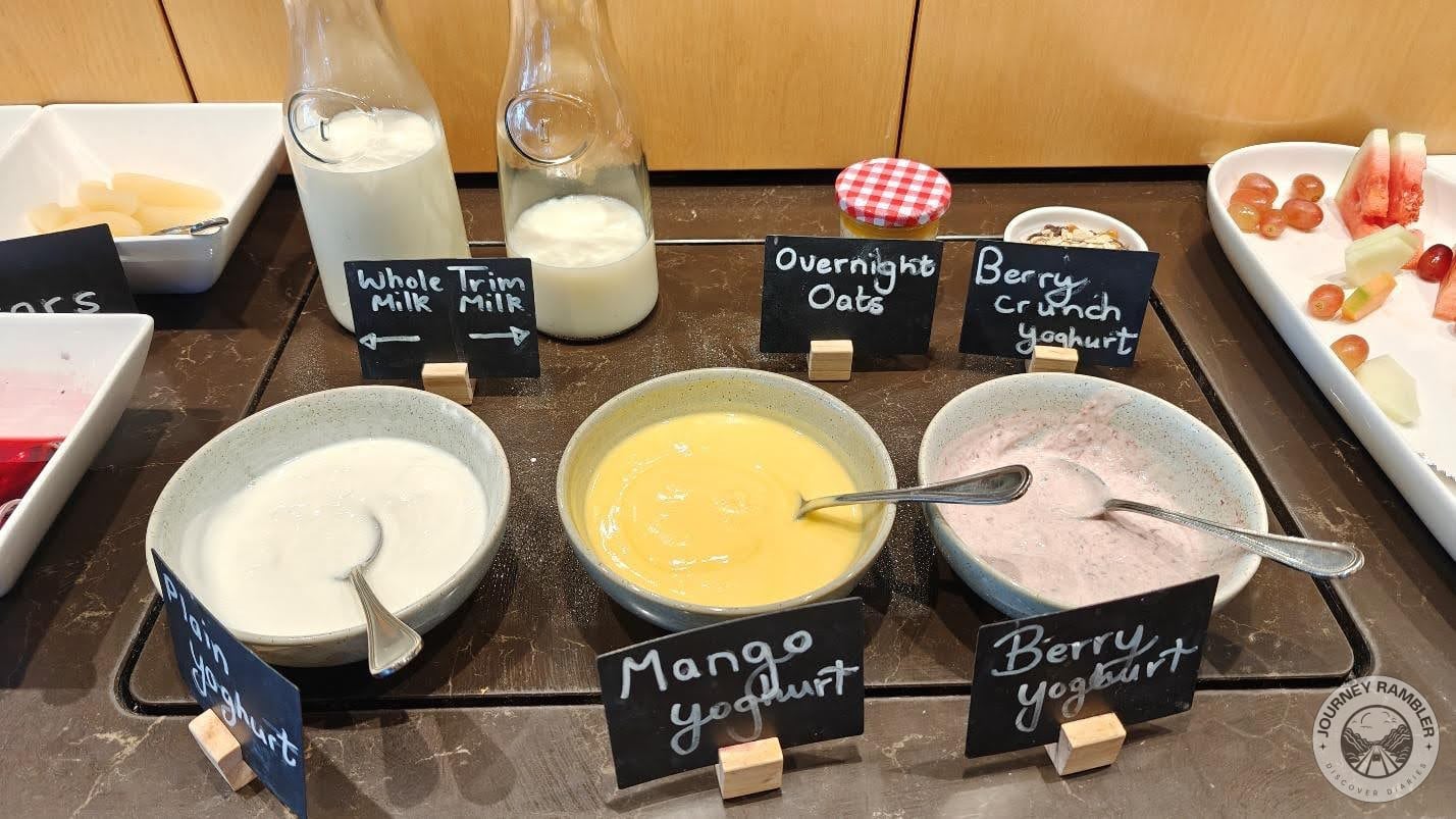 two kinds of milk and a variety of flavored and unflavored yogurts