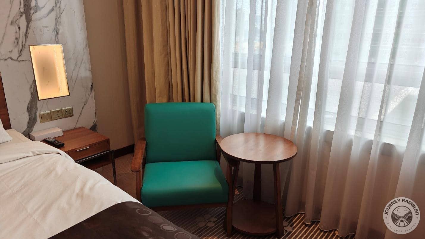 very comfy arm chair and round side table