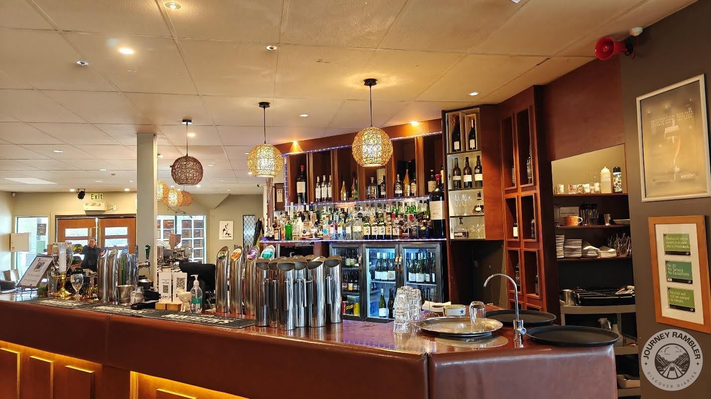 well-stocked bar on one side of the restaurant