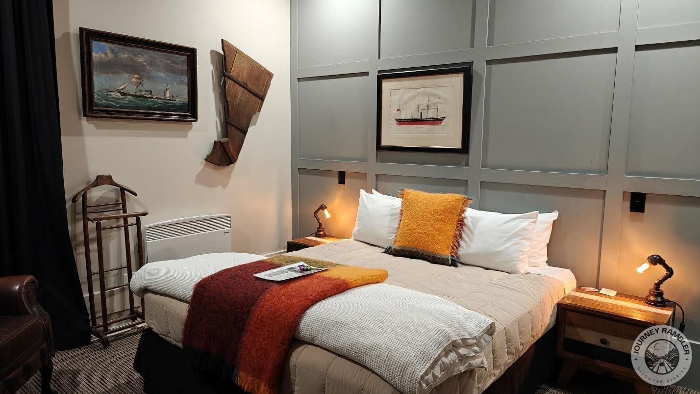 Portraits and sketches of ships hung on the walls