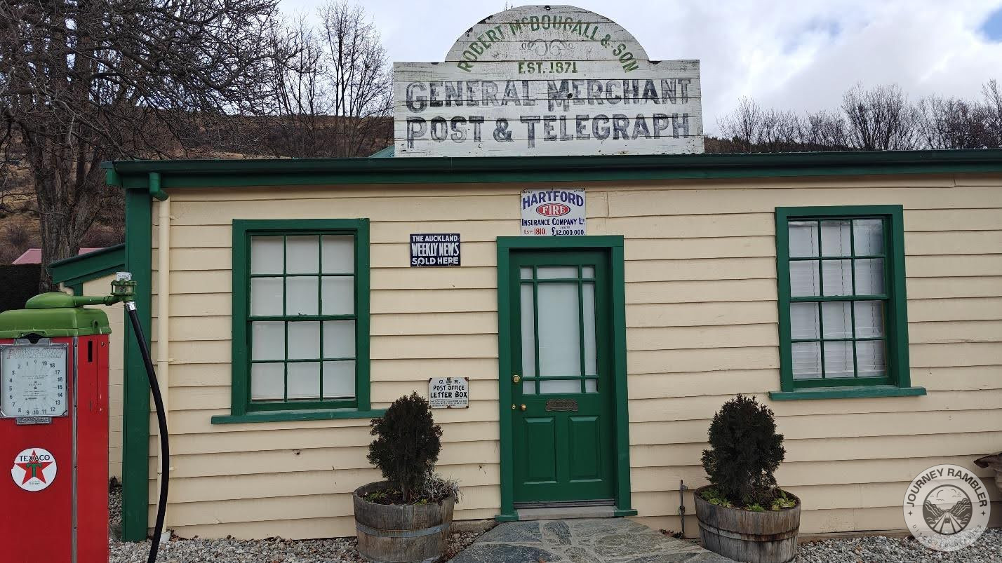 Potted plants had been placed in big wooden tubs outside the door