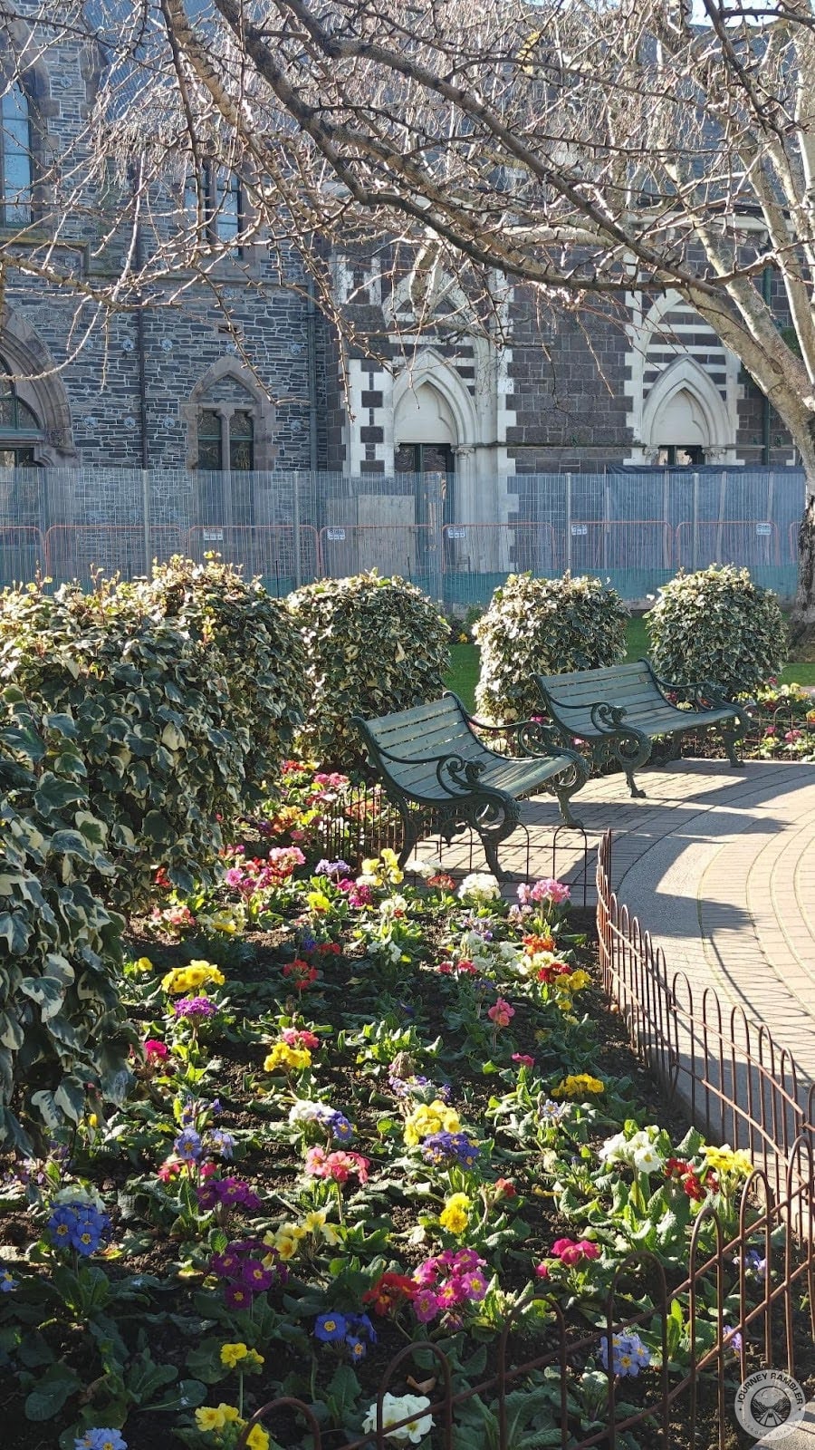 Surrounding the Peacock Fountain are flower beds and these benches