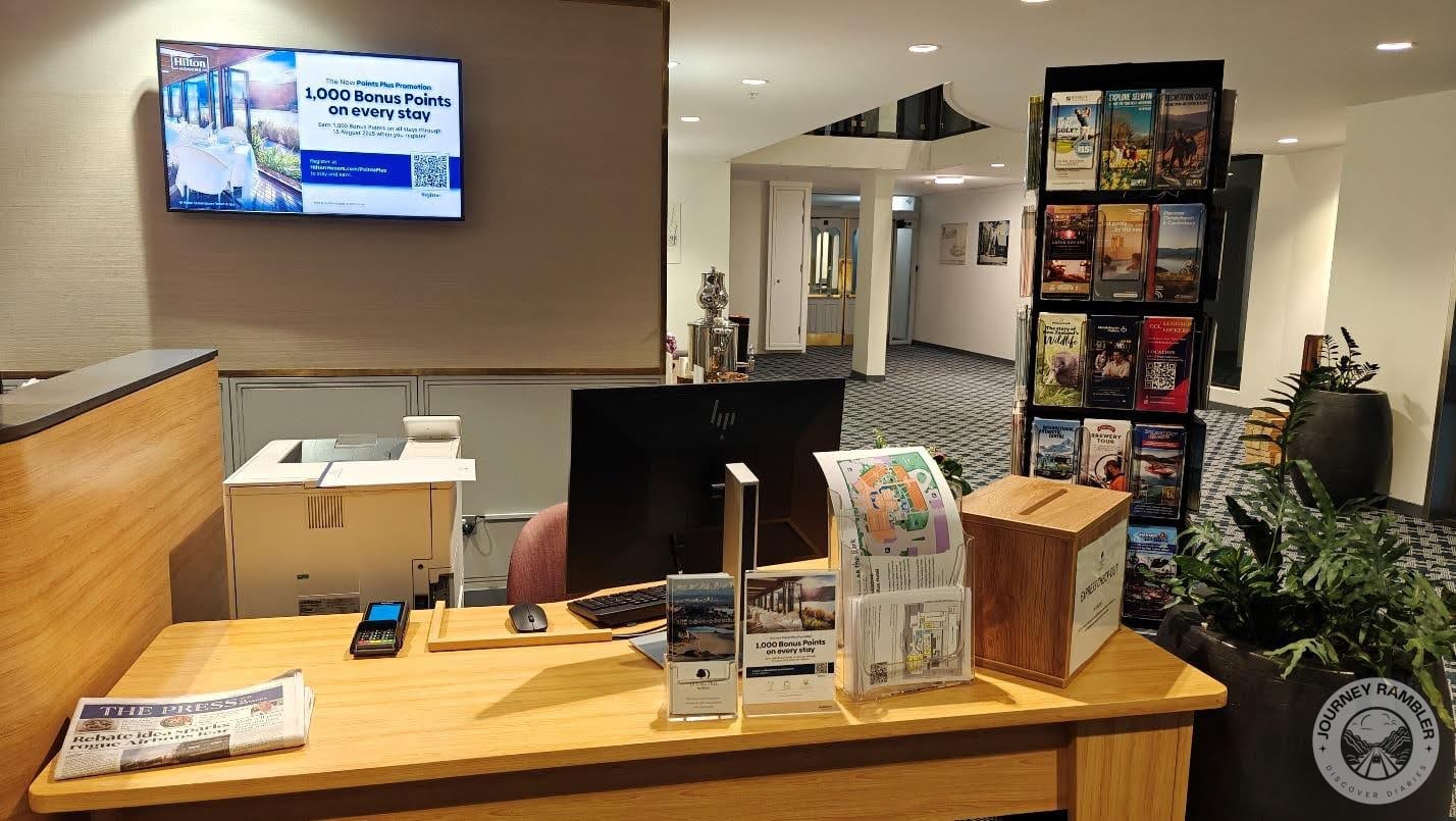 all kinds of magazines, newspapers and brochures at the desk